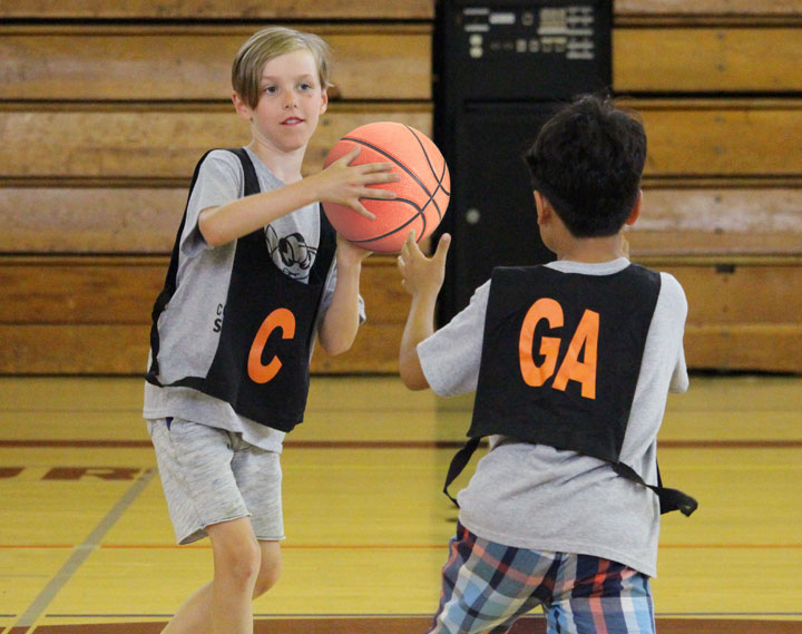 children playing basketball